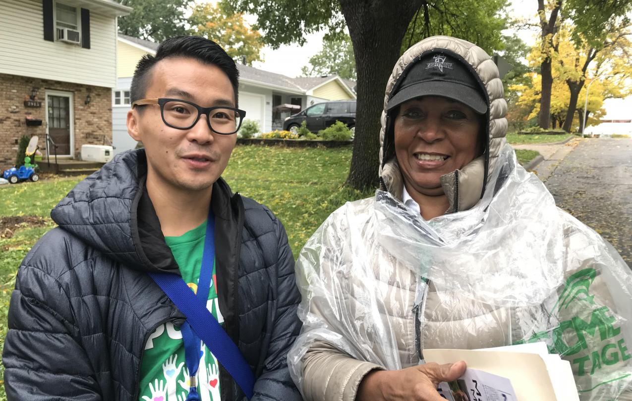 Member Organizers David Yang (Local 34) and Starr Suggs (Local 3142) knock doors in Richfield, Minnesota